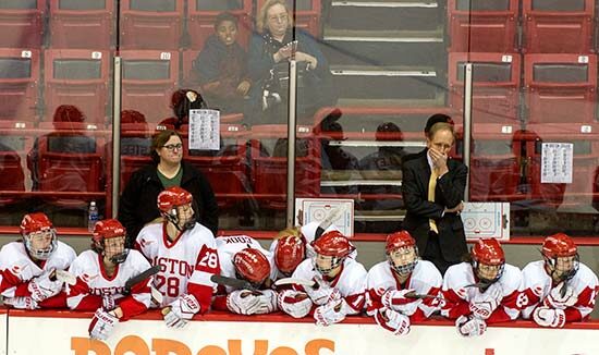 BU Terriers women's ice hockey players on the team bench react to a Boston College goal during the 39th Annual Women's Beanpot Tournament