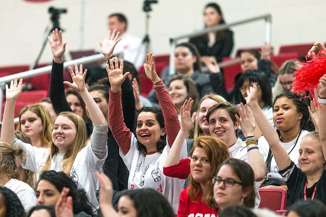 Students using sign language for applause