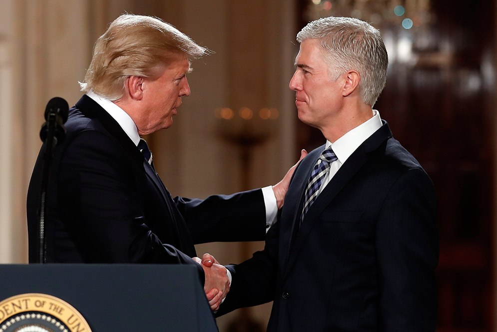 Donald Trump shaking Neil Gorsuch's hand