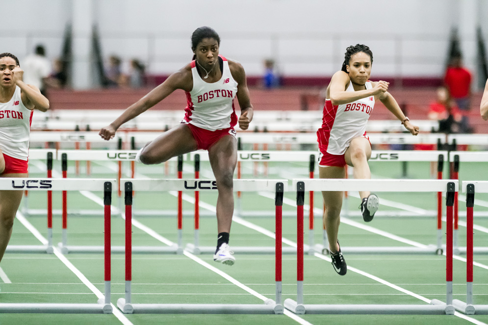 Toria Levy running hurdles