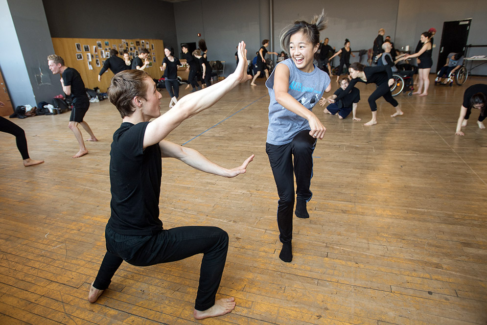 Bo Krucik and Lani Dickinson dance together during a movement class