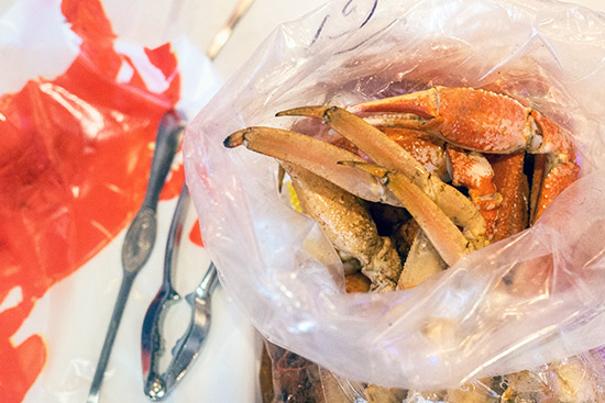 Visitors ordering the Holly Crab Boil customize their meal by choosing the seafood, sauces like garlic butter and lemon pepper, and the degree of spiciness. 