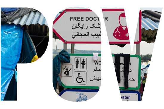 Free Doctor and Drinkable Water signs in a Syrian Refugee Camp in Eidomeni, Greece