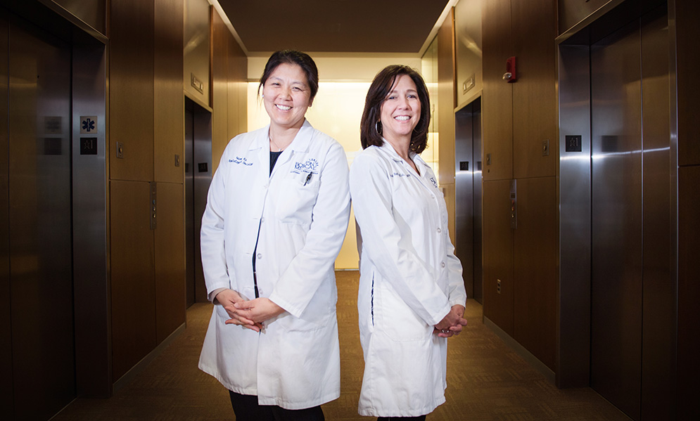 Tracy Battaglia director of Boston University School of Medicine Center of Excellence In Women's Health and director of medical education at Boston Medical Center Belkin Breast Health Center, with Naomi Ko, assistant professor of hematology and medical oncology at Boston University School of Medicine