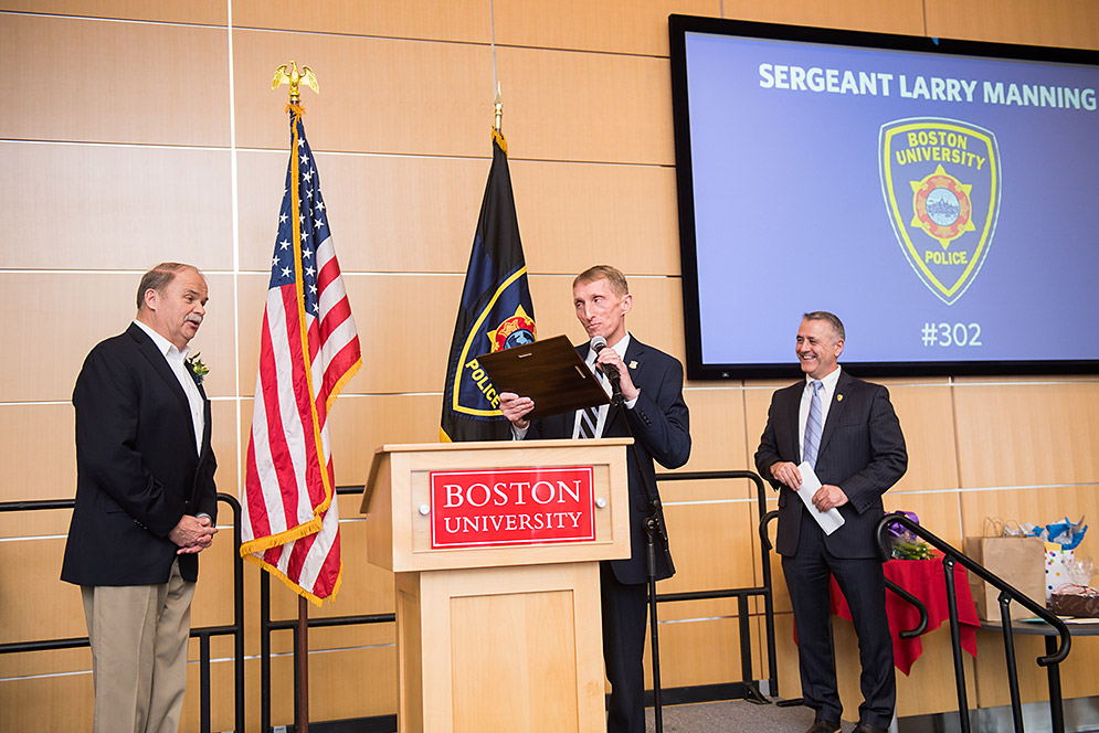 Bill Evans presenting Sgt Larry Manning a plaque