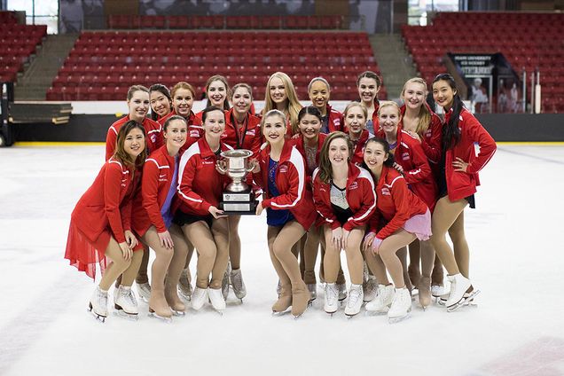 Group photo of BU Figure Skating Club on ice