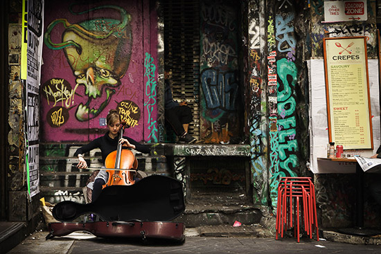 Laura Burvill took the top prize for her vibrant photograph of a cellist on a small side street in Melbourne, Australia.