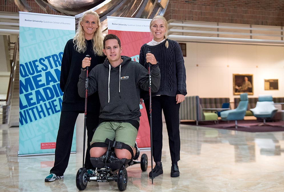 Exero Technologies team members enrolled in the Norway Entrepreneurship Program at Questrom School of Business pose with the Exero Spike sled product they developed