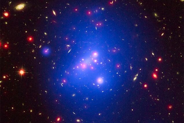 A young galaxy cluster seen in X-rays, visible light, and infrared light