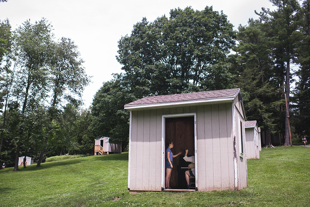 students practicing in shed