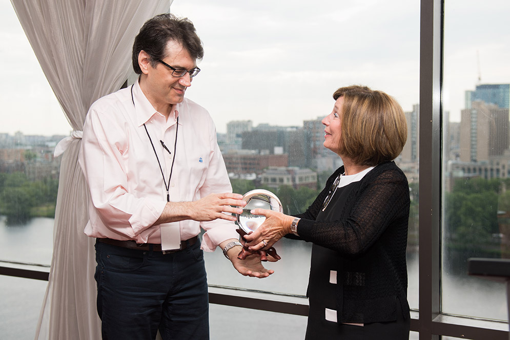 Gloria Waters presents Erik Katsavounidis with award