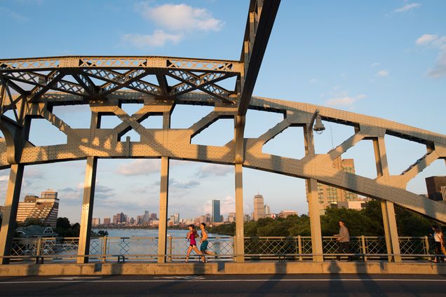 Runners on BU Bridge at sunset