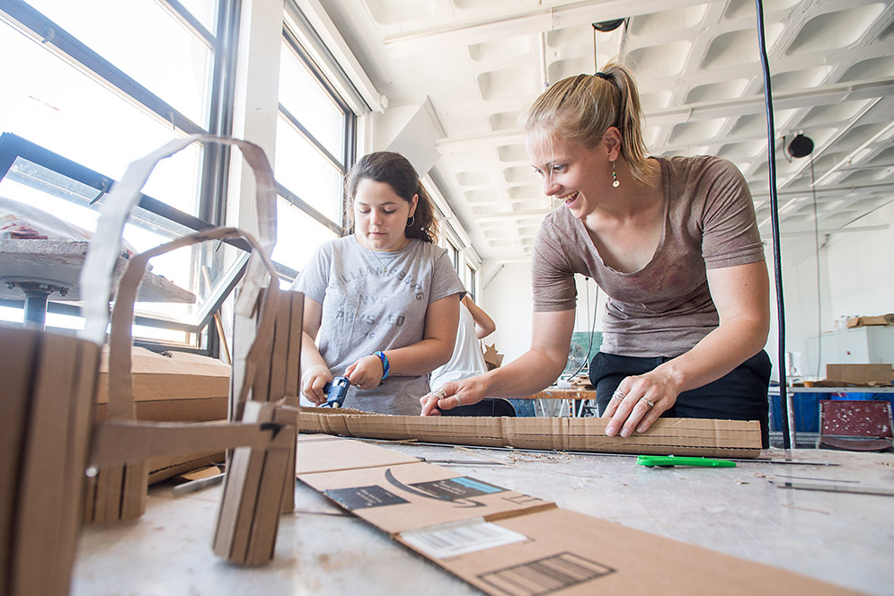 Claire Roll assisting Karina Chaoul with sculpting