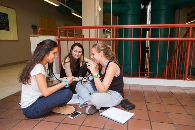 Students in Biology II lab, Intro to Physiology, take each others' blood pressure before running the stairs and taking their blood pressure a second time.