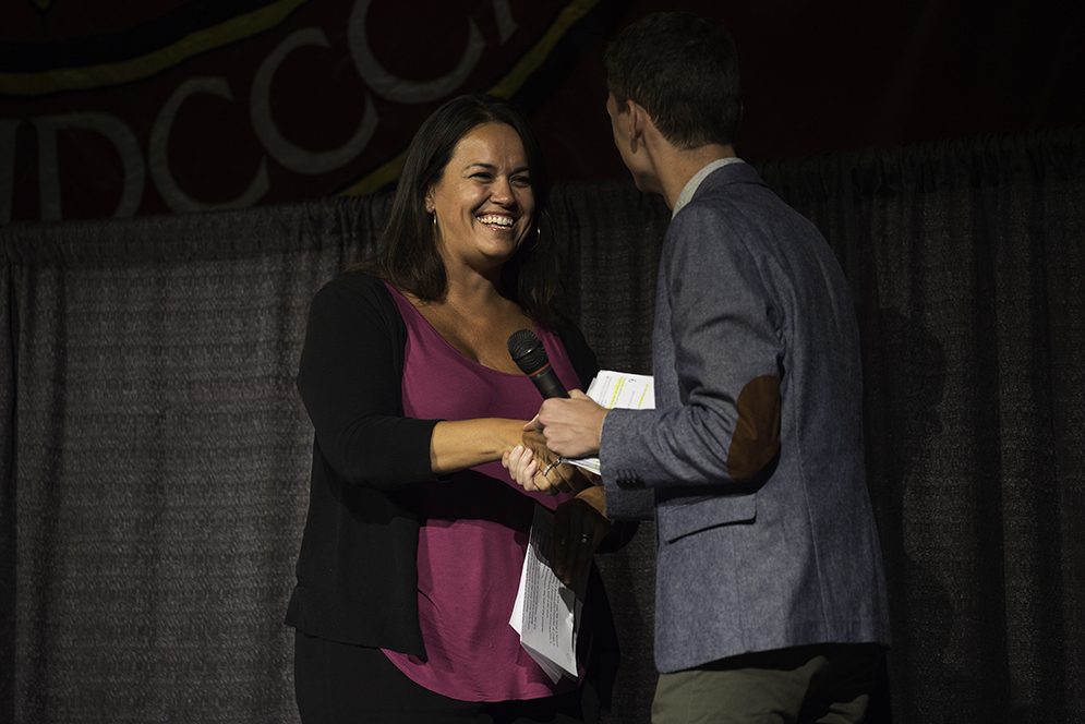 Boston city councilor-at-large, Annissa Essaibi George shaking hands with FYSOP coordinator Tyler Armey