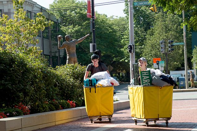 BU students pushing yellow carts