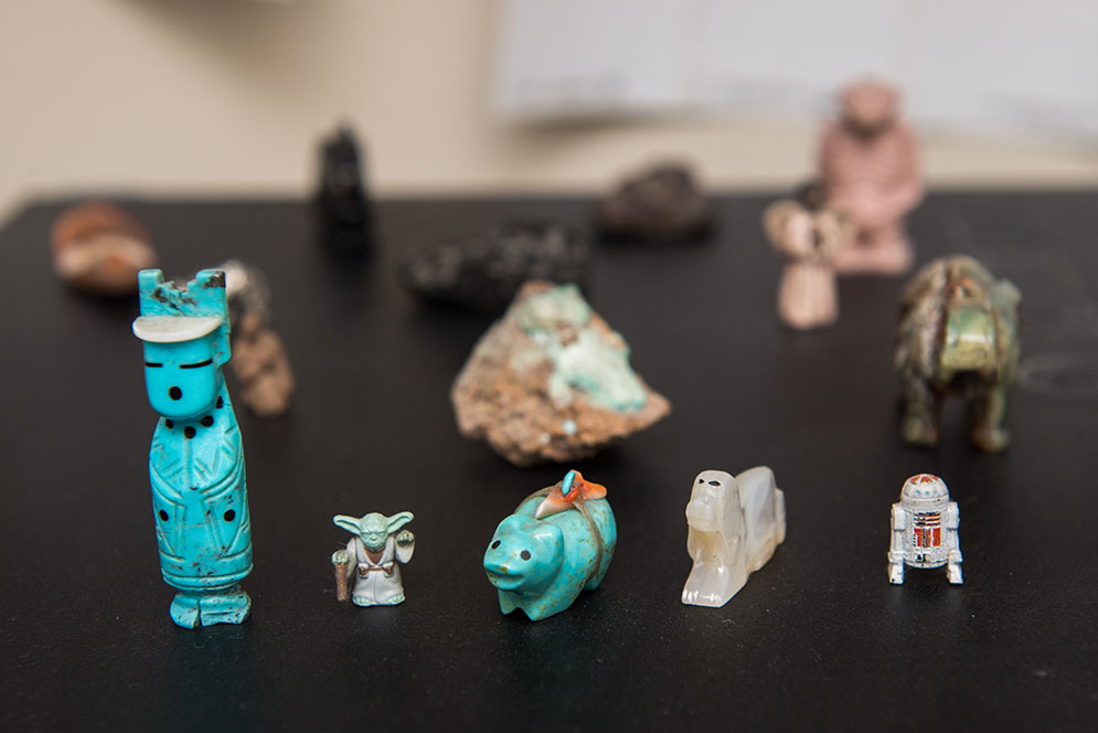 Miniature Zuni figures displayed in the office of Boston University College of General Studies advisor, Louis Mayhew