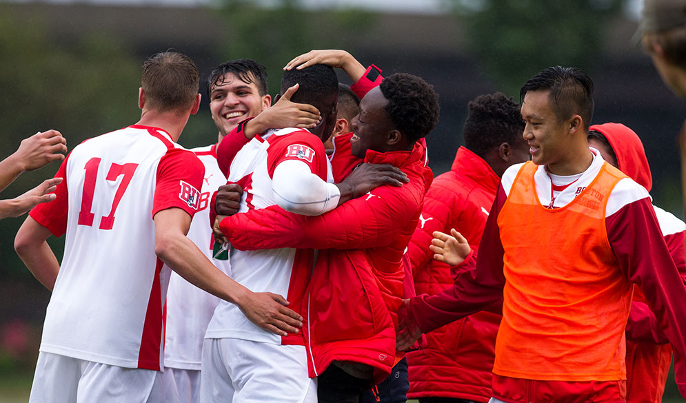 Group shot of BU Men's team at Boston University Men's Soccer versus the Haitian National team at Nickerson Field