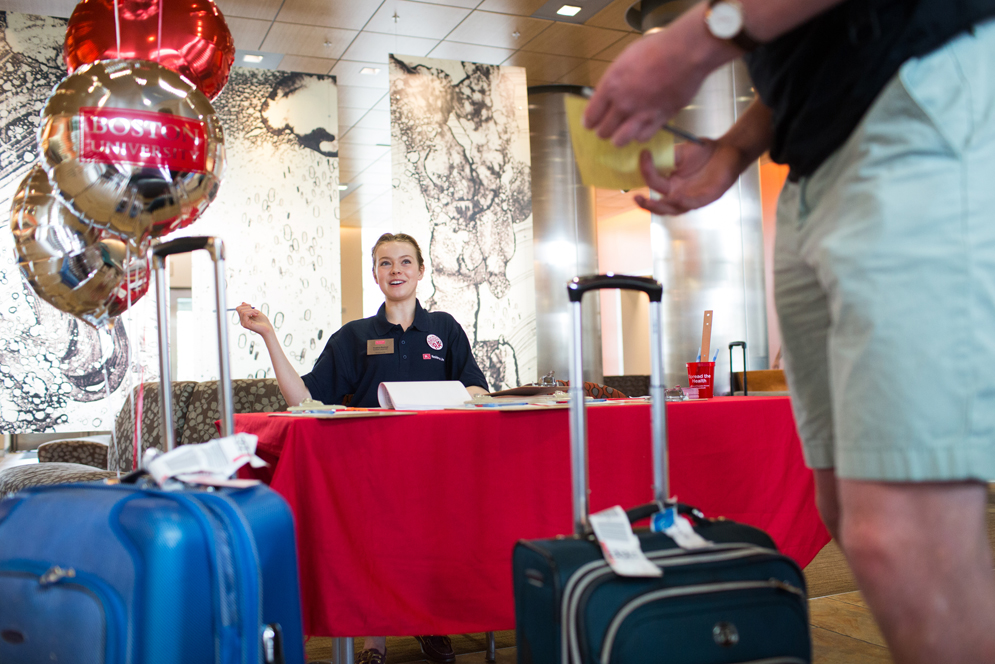 Resident Assistant checks in students during Boston University Fall Move In 2017