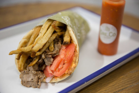 The classic pork ($9) gyro, pork, tomato, onion, a topping of your choice, and fries, wrapped in a pita, is the most popular item.