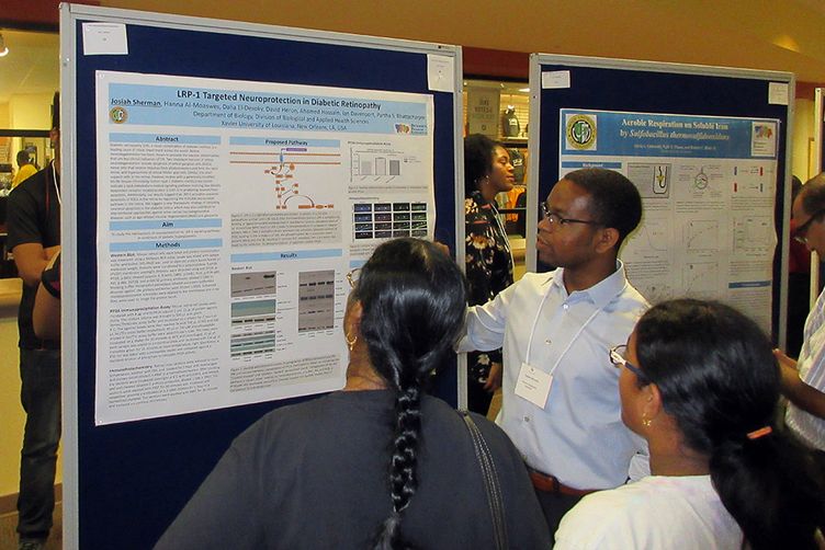 Josiah Sherman, an undergraduate majoring in biology at Xavier University, in New Orleans, explaining his research at Xavier’s 2017 summer research symposium. As part of a new NSF grant to engage underrepresented minorities in exploring STEM careers, the BU School of Medicine will offer opportunities for Xavier students to meet with researchers at BU. Photo courtesy of Xavier University