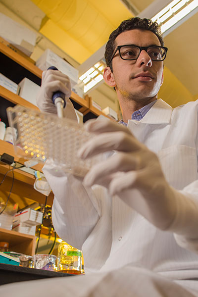 Synthetic biology researcher Ahmad "Mo" Khalil, assistant professor of biological engineering at Boston University, and researcher at the Boston University Biological Design Center