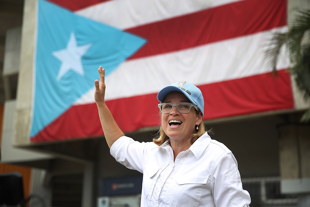 San Juan Mayor Carmen Yulin Cruz speaks to the media as she arrives at the temporary government center setup at the Roberto Clemente stadium in the aftermath of Hurricane Maria on September 30, 2017 in San Juan, Puerto Rico.