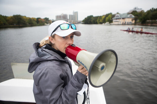 Madeline Davis Director of Women's Rowing at Boston University at practice on the Charles River