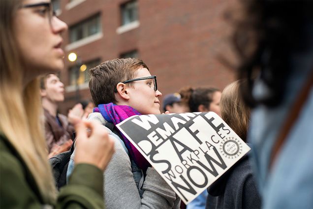 Attendees of the Boston University Workers Union’s rally against sexual harassment in higher education listen to speakers’ remarks Wednesday evening in the Metcalf Science Center Plaza.