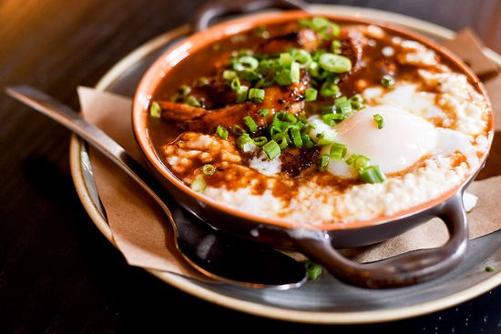 The shrimp and grits is a standout: well-seasoned shrimp nestled in a bed of grits, topped with a slow-cooked poached egg. Photo by Maddie Malhotra (COM’19)