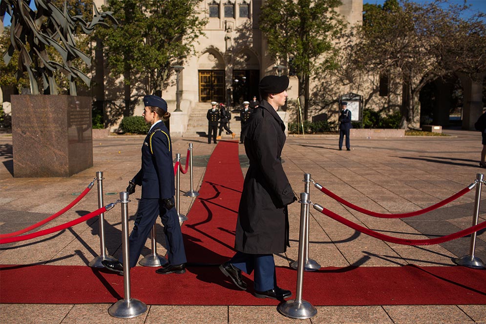 Air Force and Army cadets march on Marsh Plaza at Boston University during a vigil to honor US veterans of war.