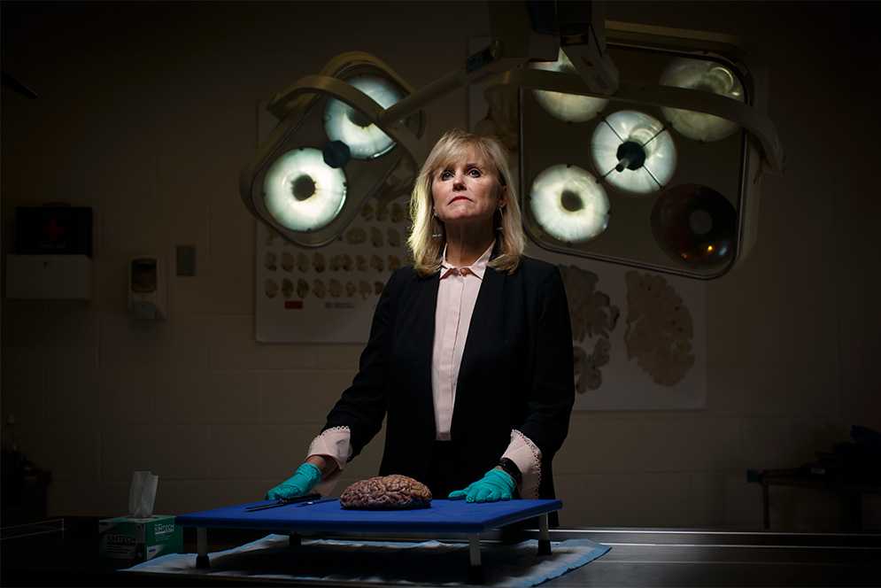 Portrait of chronic traumatic encephalopathy (CTE) expert Ann McKee in her lab at the Boston University CTE Center