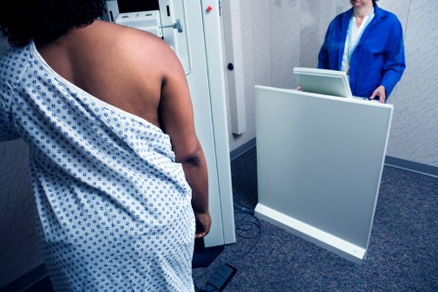 Woman getting mammogram