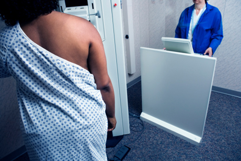 Woman getting mammogram