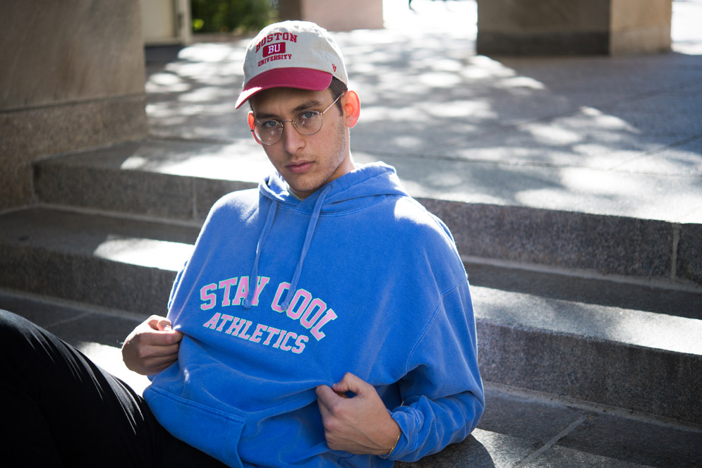 Amin poses in a Stay Cool athletics hoodie.