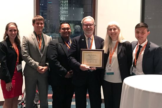 Herbert Voigt receiving the Outstanding Service and Dedication Award from the biomedical engineering honor society Alpha Eta Mu Beta in 2016. 