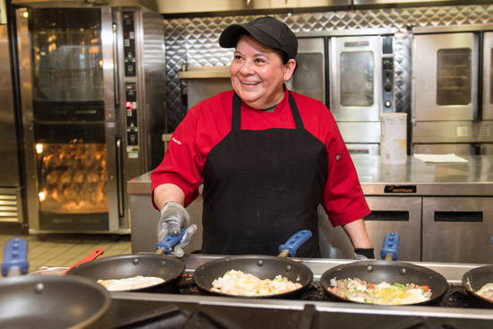 Cecilia, cooking omelets at Warren Towers