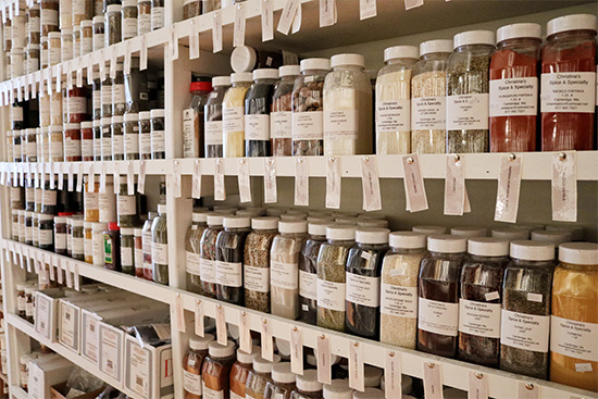 Spices displayed on a shelf at Christina's Spice and Specialty Store in Inman Square, Cambridge, MA