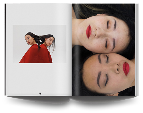 Opened issue of Charcoal Magazine showing two asian women seemingly connected by hair and a red jacket on the left, and full page photo of two asian women lying head to head on the right