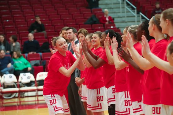 Williams high fives her teammates