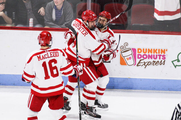 BU celebrating a victory after making it to the semifinal round of the men's Hockey East tournament.