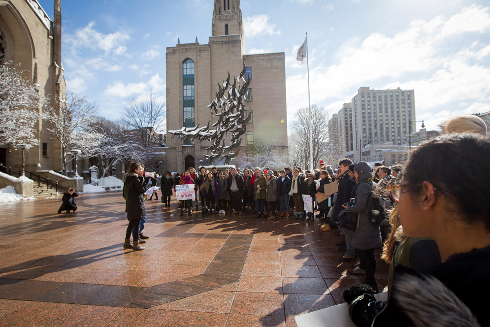 Students on Marsh Plaza participating in the national walkout protesting gun violence.