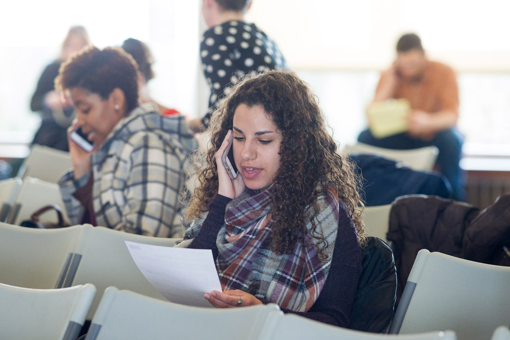 Students participate in a Community Forum on Gun Violence hosted by the Boston University School of Public Health by calling political representatives to talk about gun violence