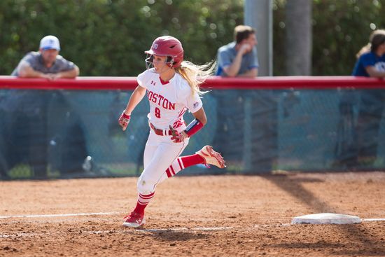 Jilee Schanda runs around the bases