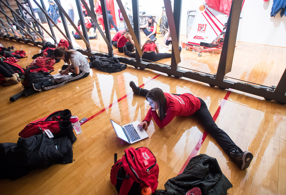 Cristina Bartlett studies before a basketball game