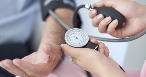 nurse measuring blood pressure