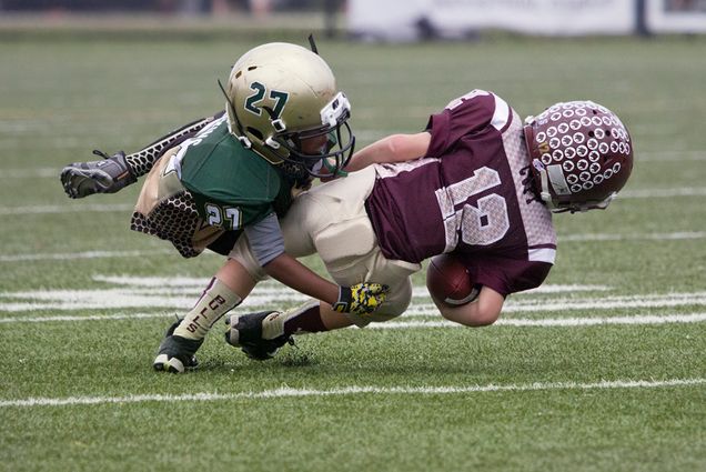 kids playing tackle football