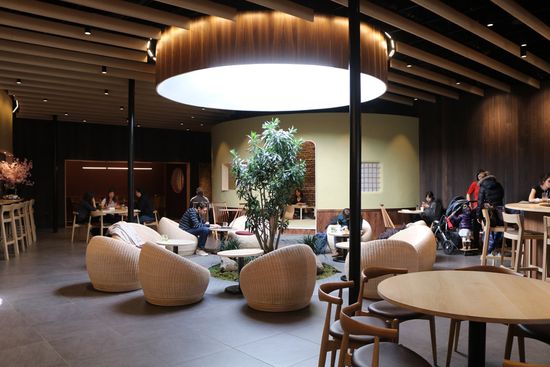 A large skylight fills the restaurant with natural light. 