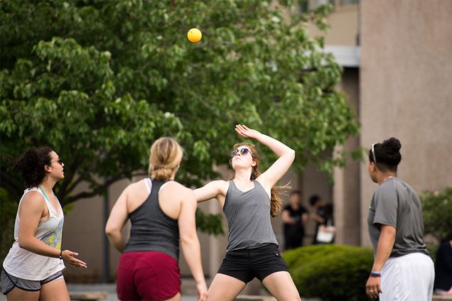 BU students play Spike Ball on the College of Communication lawn.