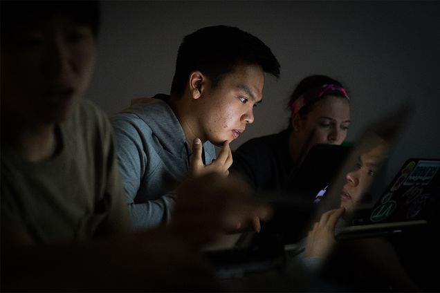 A student studies x-ray and MRI images during a class at the Boston University Sargent College of Health & Rehabilitation Sciences